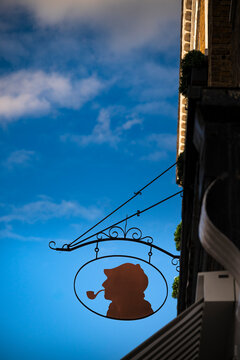 Sherlock Holmes symbol on display outside building in Baker Street, London
