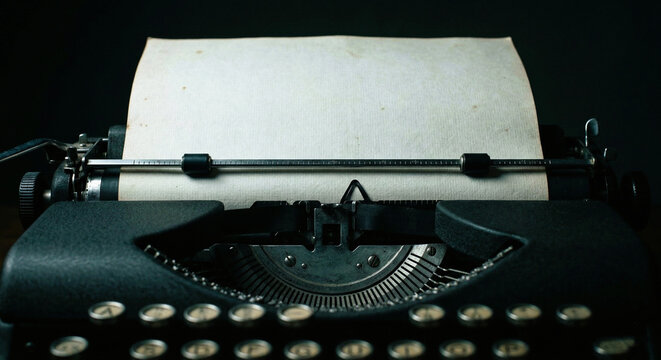 Vintage Black Typewriter Holding Blank Aged Paper In Carriage