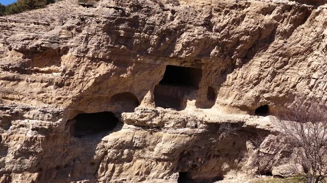 Drone footage of the Teke Sarayı cave settlements and chamber tombs, carved into the rock and dating back to ancient times, in the Seren&ccedil;ay Canyon in Burdur.