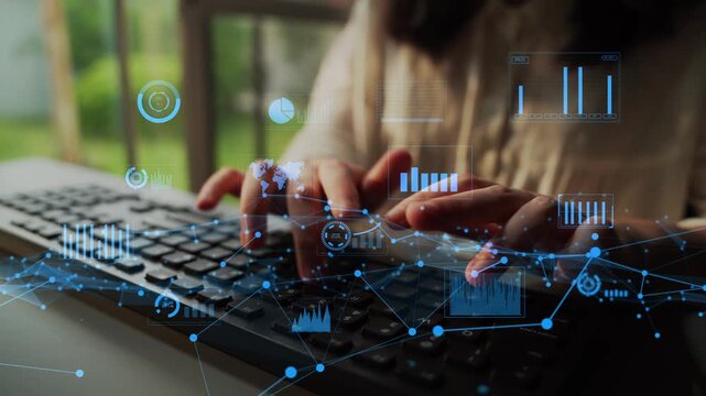 A close-up of hands typing on a keyboard, complemented by a digital interface overlay featuring graphs and charts that symbolize data analysis and innovation in a modern workspace. Xenic
