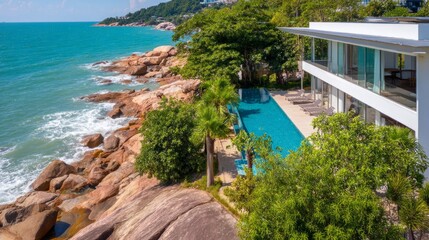 Fototapeta premium Luxurious Villa by the Breezy Sea Under a Bright Day with Stunning Views