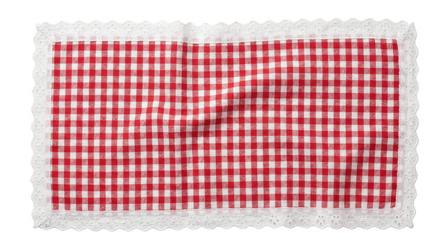 Wrinkled red gingham checkered fabric napkin with white eyelet lace border on a transparent background