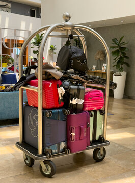 Cape Town South Africa. 23.12.2024. A hotel bellman's cart is piled high with various suitcases and bags, ready for transport