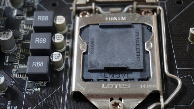 Purwokerto, Indonesia - 17 March 2026: Close-up of an empty CPU socket on a computer motherboard, showing electronic circuit details.