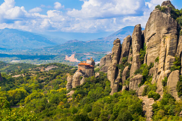 Fototapeta premium Panoramic view of Holy Monastery of St. Nicholas Anapafsas on top of Meteora rocks in Thessaly, Greece