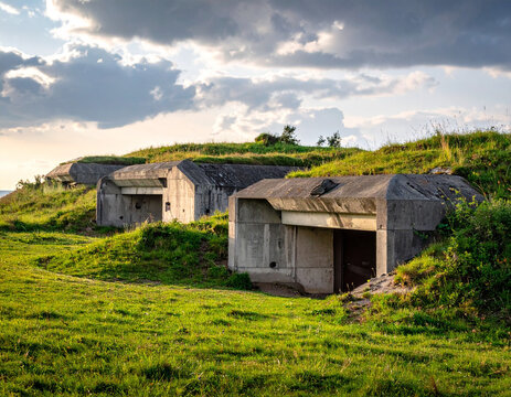 Reinforced concrete bunkers designed to withstand extreme attacks, showing resilient defense architecture design.