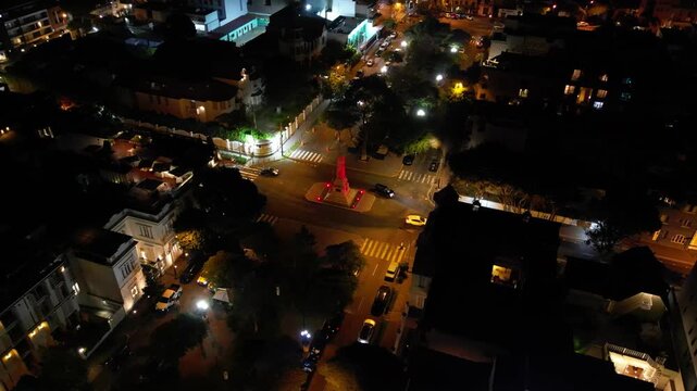 Night aerial view of the illuminated Don Jos&eacute; de San Mart&iacute;n monument in the Barranco district of Lima.