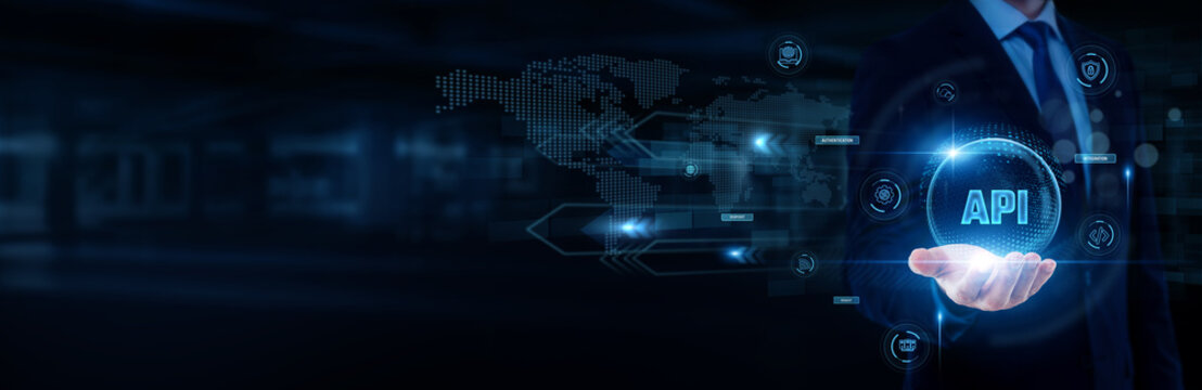 Software developer hand holding with worldwide network connection, system integration, cloud computing, web services, API development concept.