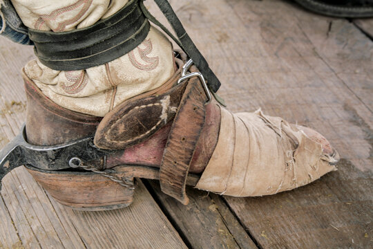  Galiesteo Rodeo, New Mexico  Rodeo cowboy wearing worn out cowboy boots