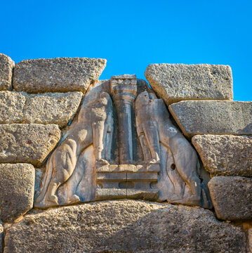 Carved stone on top of Lion Gate entrance in the archaeological site of Mycenae, Peloponnese, Greece