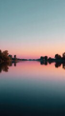 Obraz premium Tranquil Sunset Reflections on a Calm Lake