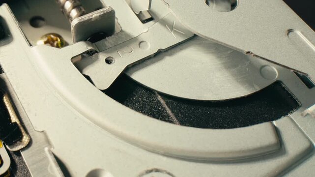 Floppy disc FDD close up, Using diskette for old PC computer macro. Archive programme or Music recorder, playing retro computer games. Vintage device for office, obsolete technology. 