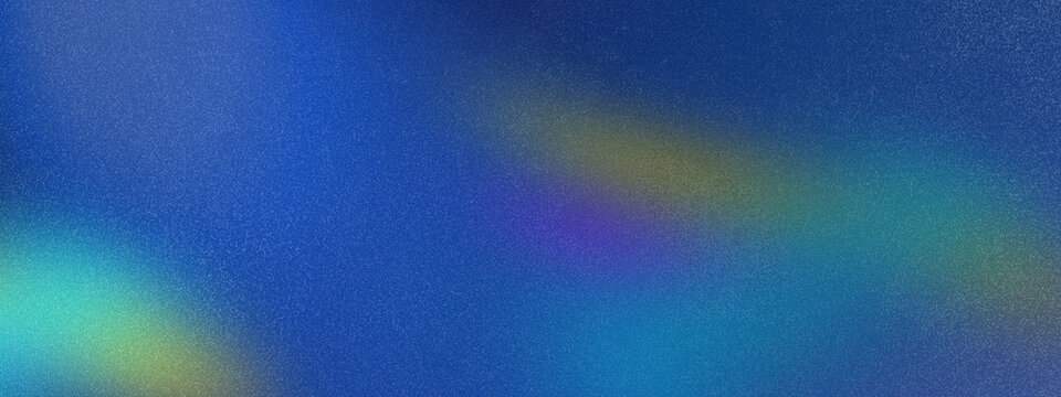 Abstract blue background showing light rays and textured grain
