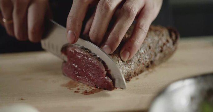 Chef Slicing Fresh Beef