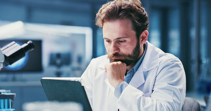 Science, review or man with tablet in lab, online research article or pathology trial study for info. Experiment results, reading or scientist with vaccine development news, medical journal or tech