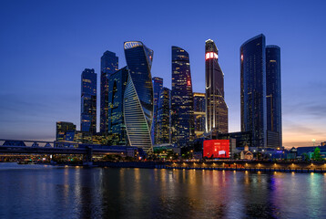 Obraz premium Night view of skyscrapers of Moscow City business center and Moscow river in Moscow, Russia, Russia