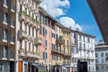Milan, italy, april 1, 2024. Milan brera district street with colorful historic facades, balconies...