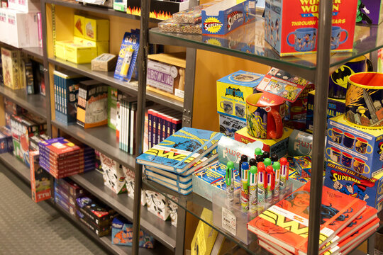 SFU University store shelves displaying DC Comics merchandise, mugs, games and gifts
