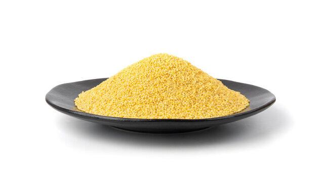 Raw millet grains pile isolated. Little yellow cereal, natural foxtail small seeds