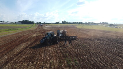 tractors working in the field