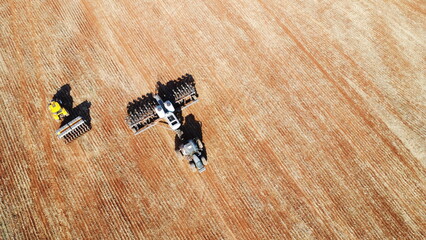 tractors working in the field © CarlosEduardo