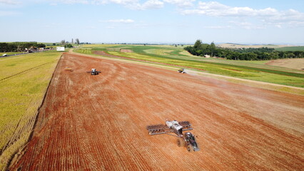 tractors working in the field © CarlosEduardo