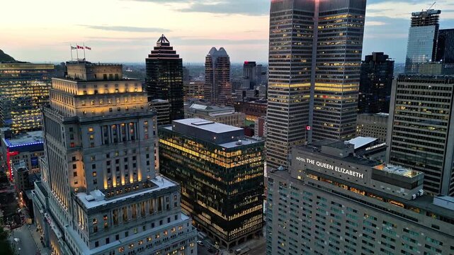 Aerial view of downtown Montreal at blue hour featuring Sun Life Building and city skyline, Quebec, Canada