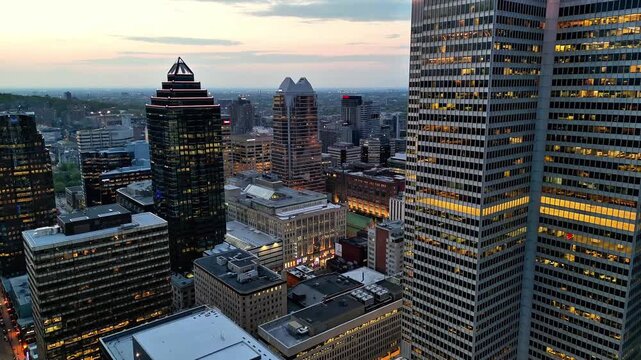 Aerial view of downtown Montreal at blue hour featuring Sun Life Building and city skyline, Quebec, Canada
