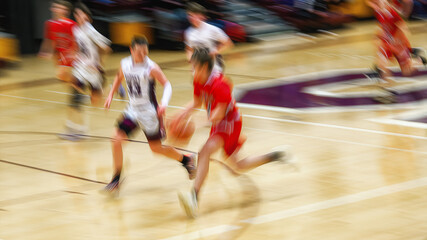 High School Basketball with motion blur showing the speed and movement of the young boys playing the game at Oxford HS in Upstate NY © Chet Wiker