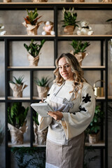 Smiling woman working as florist, managing small business