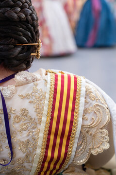 Fallera hair and traditional dress detail during Fallas Valencia festival