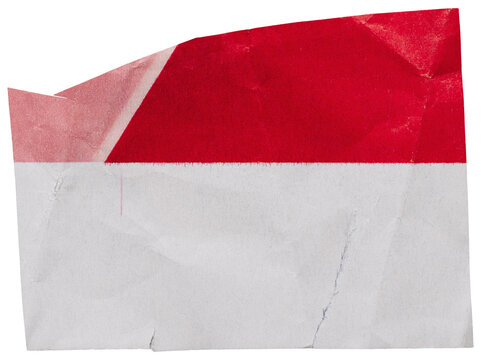 White crumpled scrap of paper with red print cut out from magazine, isolated for collage, copy space