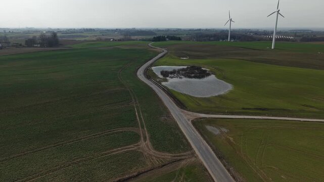 Dynamic Backward Flight Over Farmland Road With S-Shaped Curves