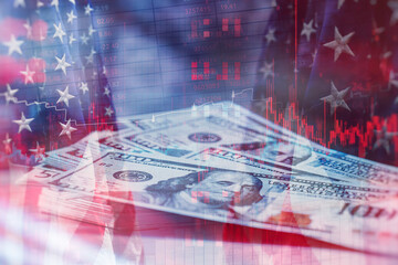 Stack of one hundred dollar bills layered with the US flag and a red declining stock market...
