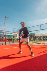 Padel Player in Action During Match, Sports Editorial or Event Promotion