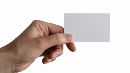 Obraz premium A hand holding a blank white card on a plain background