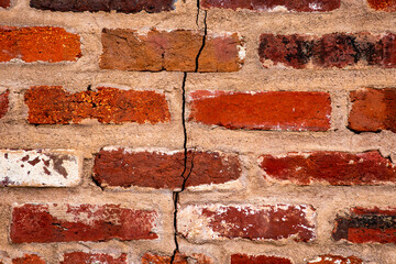 Broken bricks wall background texture. Broken bricks brickwall pattern surface. Broken bricks masonry structure wall. Broken bricks rustic grunge texture.