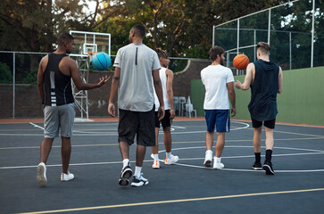 Fototapeta premium Fitness, back and team with men on basketball court for competition match, game practice and sports. Athlete training, workout and challenge with people for health, collaboration and exercise
