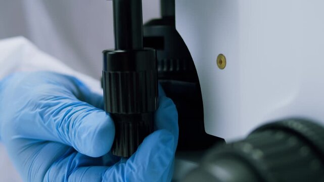 Engineer doctor working with microscope in laboratory, Scientific laboratory with various research equipment, man conducting experiments and research, Science and technology concept.