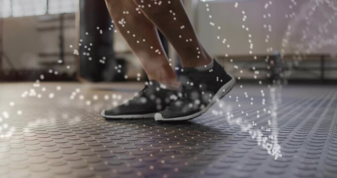 Man lifting feet, skipping on rubber gym floor, overlay tracing foot arcs, improving cadence