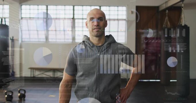 Fitness coach responding to HUD charts shifting, shifting weight and placing hands on hips