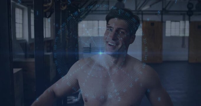 Camera cueing man letting rig go, smiling and engaging camera while fitness overlay showing numbers