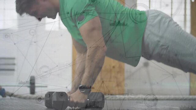 Fitness man holding hex dumbbells in plank switching pushup, one-arm row, overlay showing strength