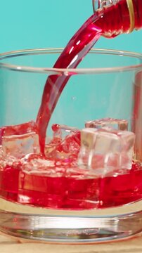 Vermouth Negroni, spanish wine drink, Alcoholic Americano Cocktail bitter, sweet vermouth and soda water, close up of making drink, summer spanish vacations. 