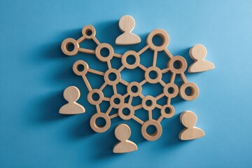 Interconnected Network of Ideas: A network of wooden figurines, intricately linked, symbolizing collaboration, connections, and the dynamic flow of ideas within a collective.