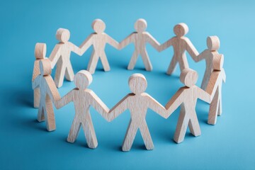 Circle of Solidarity: A visual representation of unity, the photograph depicts a circle formed by interconnected wooden figures holding hands, symbolizing community. 