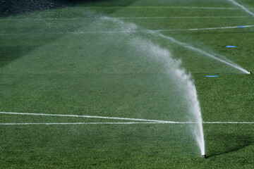 Sprinklers Watering a Football Pitch  © minortica7