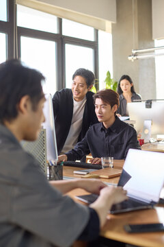 Office professionals engaged in focused work