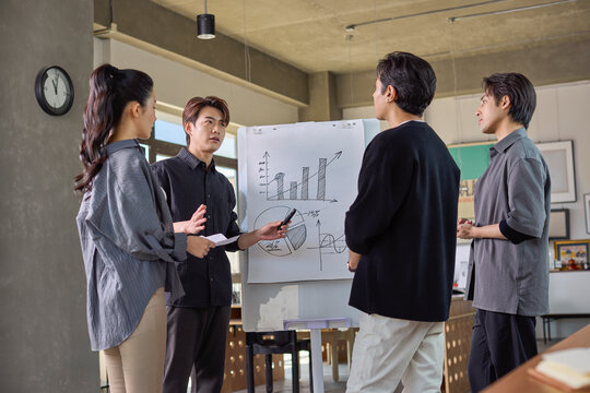 Business colleagues discussing strategies during an office meeting