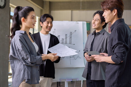 Business colleagues discussing strategies during an office meeting